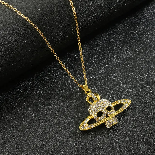 Skull Cross Saturn Necklace - High Trend Coture