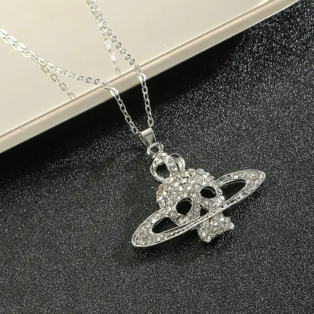 Skull Cross Saturn Necklace - High Trend Coture